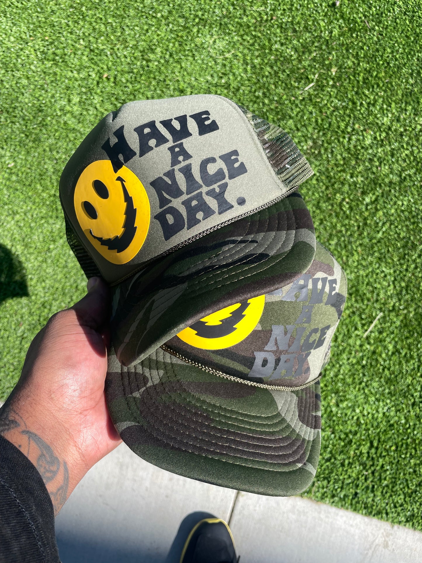H.A.N.D Smilee Trucker hats (Half & Full camo)