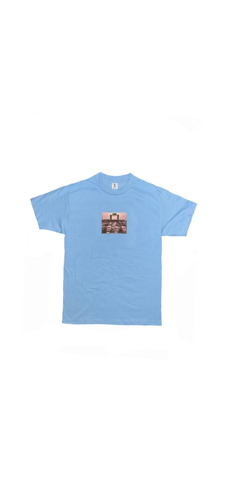 Light Blue “Daküri Drive” In Tee